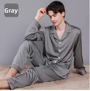 Detail of grey silk pajama set for men with contrast piping and comfortable long sleeves