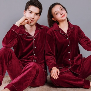 Matching couple pajamas set in wine red plush fabric with waffle texture for winter