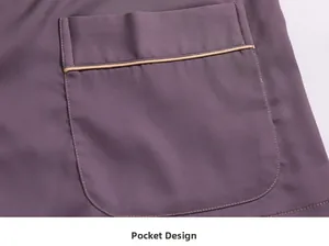Detail of silk pajama pocket with contrast piping and premium stitching