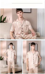Detail of men's striped satin pajama set showing the button-down shirt and silk-like fabric