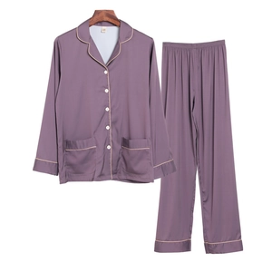 Purple silk pajama set for men featuring long sleeves and lapel collar design