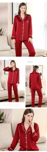 Detail view of red silk satin pajamas with white wavy trim and elegant lapel V-neck design