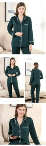 Detail of dark green silk pajamas with elegant white lace trim on cuffs and collar