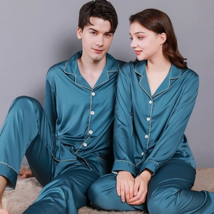 Elegant teal silk pajama set for couples with classic lapels and gold piping details