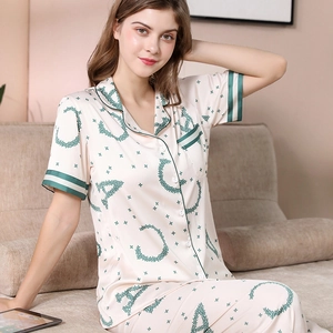Women's silk satin pajama set with short sleeve button-down shirt and long pants