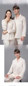 Detail of couple's cream silk pajamas featuring jacquard fabric and classic lapel