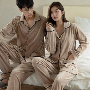 Matching couple pajamas set in plush khaki velvet with long sleeves and black piping