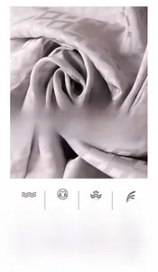 Macro detail of breathable ice silk pajama fabric with premium jacquard texture and sheen