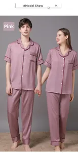 Detail view of Dusty Rose silk-like pajama set with houndsfoot jacquard and red piping