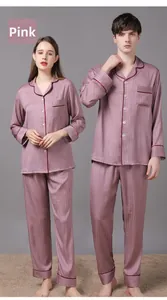 Detail of dusty rose satin pajamas set with houndstooth jacquard and contrast piping