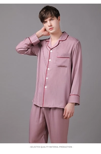 Detail of men's mauve silk pajamas showing houndstooth texture and crimson piping