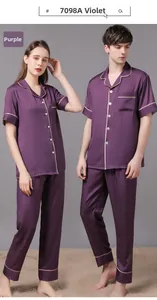 Detail view of violet silk-like pajamas with contrast piping and geometric jacquard texture