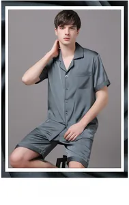 Detail of premium silk-like satin men's pajama set featuring short sleeve and soft draping