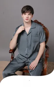 Detail of premium silk-like fabric on dark grey short sleeve men's pajama set