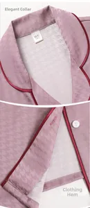 Detail of pink houndstooth silk pajamas featuring elegant lapel and contrast red piping