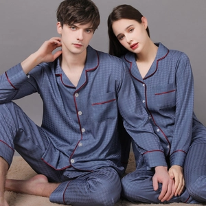 Matching couple navy silk pajamas set with houndstooth pattern and red piping detail