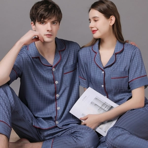 Short sleeve silk pajama set with houndstooth pattern and red piping for couples