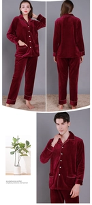 Close-up of wine red velvet couple pajamas set with quilted texture and white piping