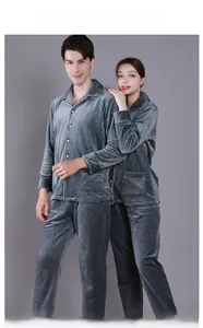 Detail of grey waffle knit pajama set for couples featuring lapel and button closure