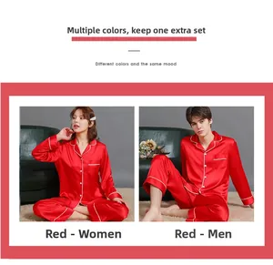 Detail of red satin couple pajamas with white piping and silky finish texture