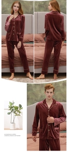 Three-way view of velvet couples' pajamas with gold trim piping and front buttons