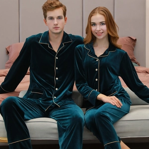 Dark green velvet couple pajama set with gold piping and classic button-down design