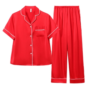 Red silk satin pajama set for couples featuring short sleeve top and long trousers