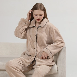 Thick apricot flannel pajama set for women featuring black piping on collar and pockets