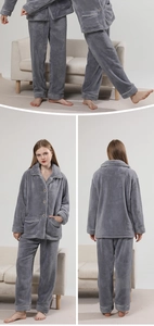 Detail view of gray thick flannel pajama set with white piping and soft coral fleece texture