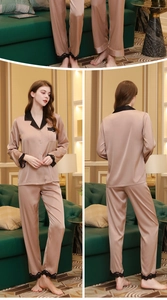 Detail of champagne silk pajama set with elegant black lace trim on collar and cuffs