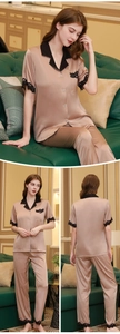 Detail of silk pajama set with champagne satin fabric and delicate black lace trim
