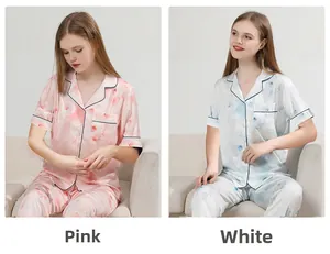 Women's silk pajama set with floral print short sleeve top and trousers detail