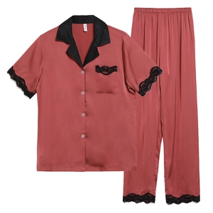 Women's brick red satin pajamas set with black lace trim and button-down short sleeve top