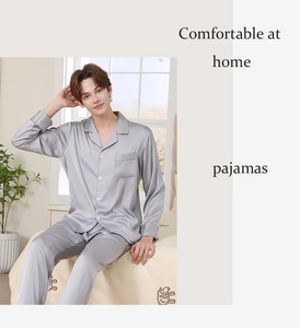 Detail of silver silk pajama set featuring high-quality lustrous fabric and piping finish