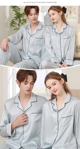 Detailed view of light blue silk pajamas with wave jacquard pattern and black piping finish