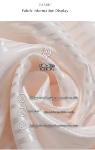 Macro detail of high-gloss peach silk fabric showing soft texture and smooth drapes