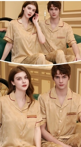 Detail of champagne silk pajamas with red piping and elegant jacquard patterns