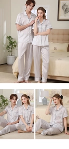 Detail of silver silk pajama set featuring smooth fabric texture and navy trim accents