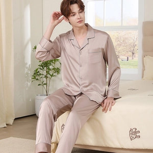 Men's champagne silk pajama set featuring long sleeves and classic V-neck collar
