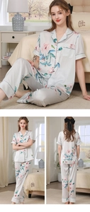 Close-up of floral print satin pajamas set with short-sleeve top and trousers