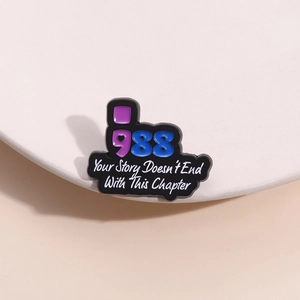 Mental health enamel pin with Your Story Doesn't End With This Chapter quote