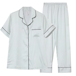 Short sleeve satin pajama set in light grey with black piping and long trousers