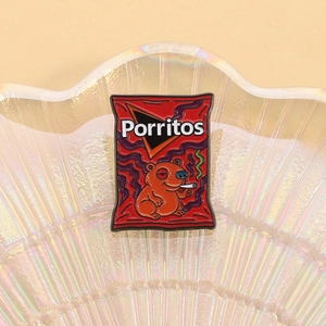 Macro shot of red alloy enamel pin inspired by snack packaging with a smoking bear