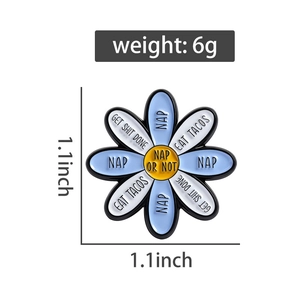 Detail view of blue daisy enamel pin with motivational quotes and 1.1 inch dimensions