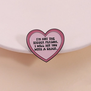 Funny pink heart enamel pin with English lettering on minimalist aesthetic background