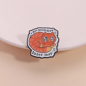 Cute orange tabby cat enamel pin with 'i am sensitive today' text for bags and clothes