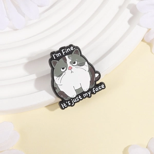 Cute grumpy cat enamel pin with I'm Fine text on a white pedestal with flowers