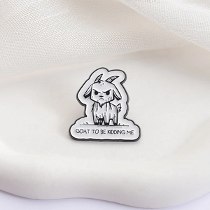 Funny goat enamel pin with GOAT TO BE KIDDING ME text on a white minimalist background