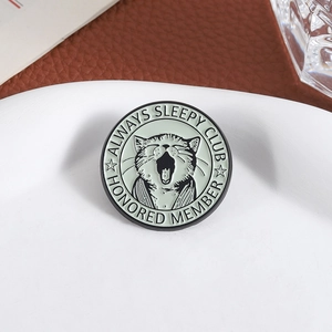 Creative enamel yawning cat brooch Always Sleepy Club metal badge on a white plate
