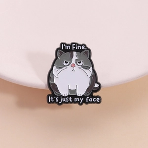 Funny grumpy fat cat enamel pin badge with I'm Fine text on a light background